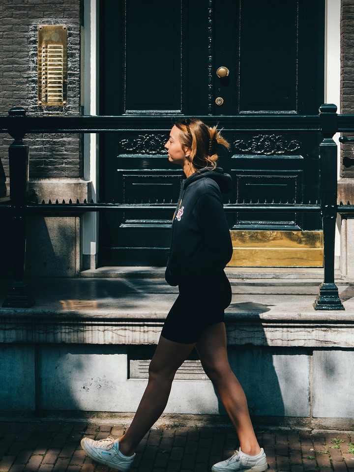 Doodle original: a woman walking past a doorway